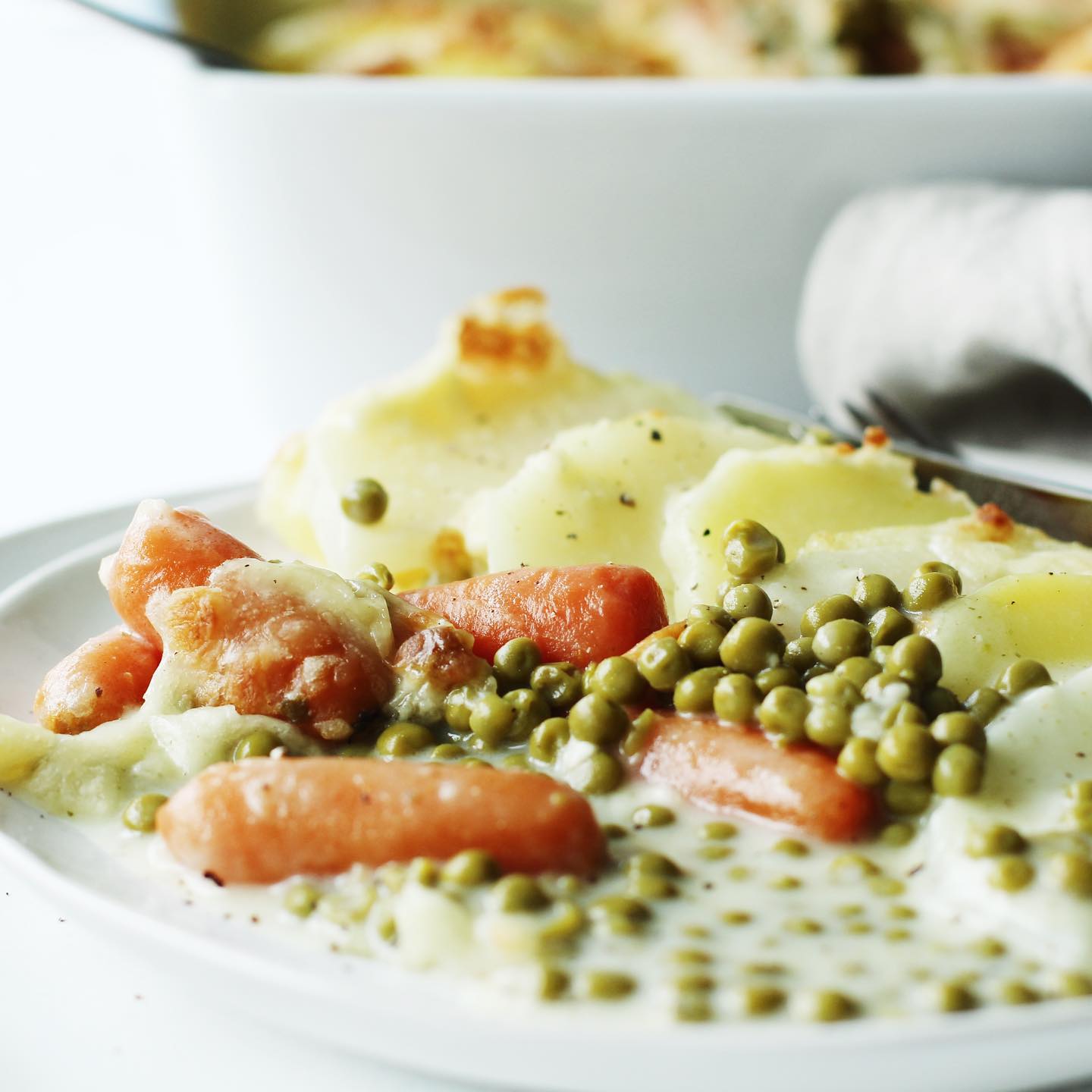 Kartoffel-Kohlrabi-Gratin mit Erbsen und Möhrchen - Campo Verde